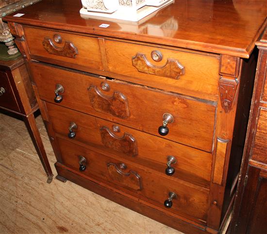 A walnut chest of drawers